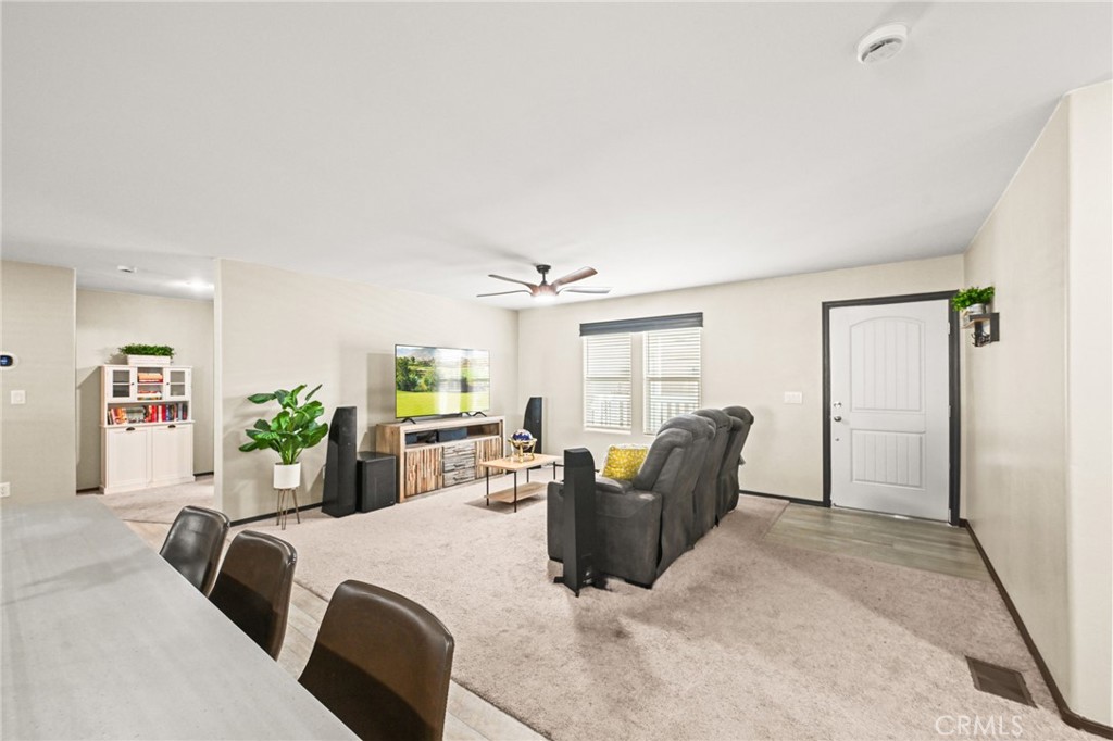 16860 Slover Avenue, Unit 70 Fontana, CA 92337 - Photo 11 of 38 a living room with furniture