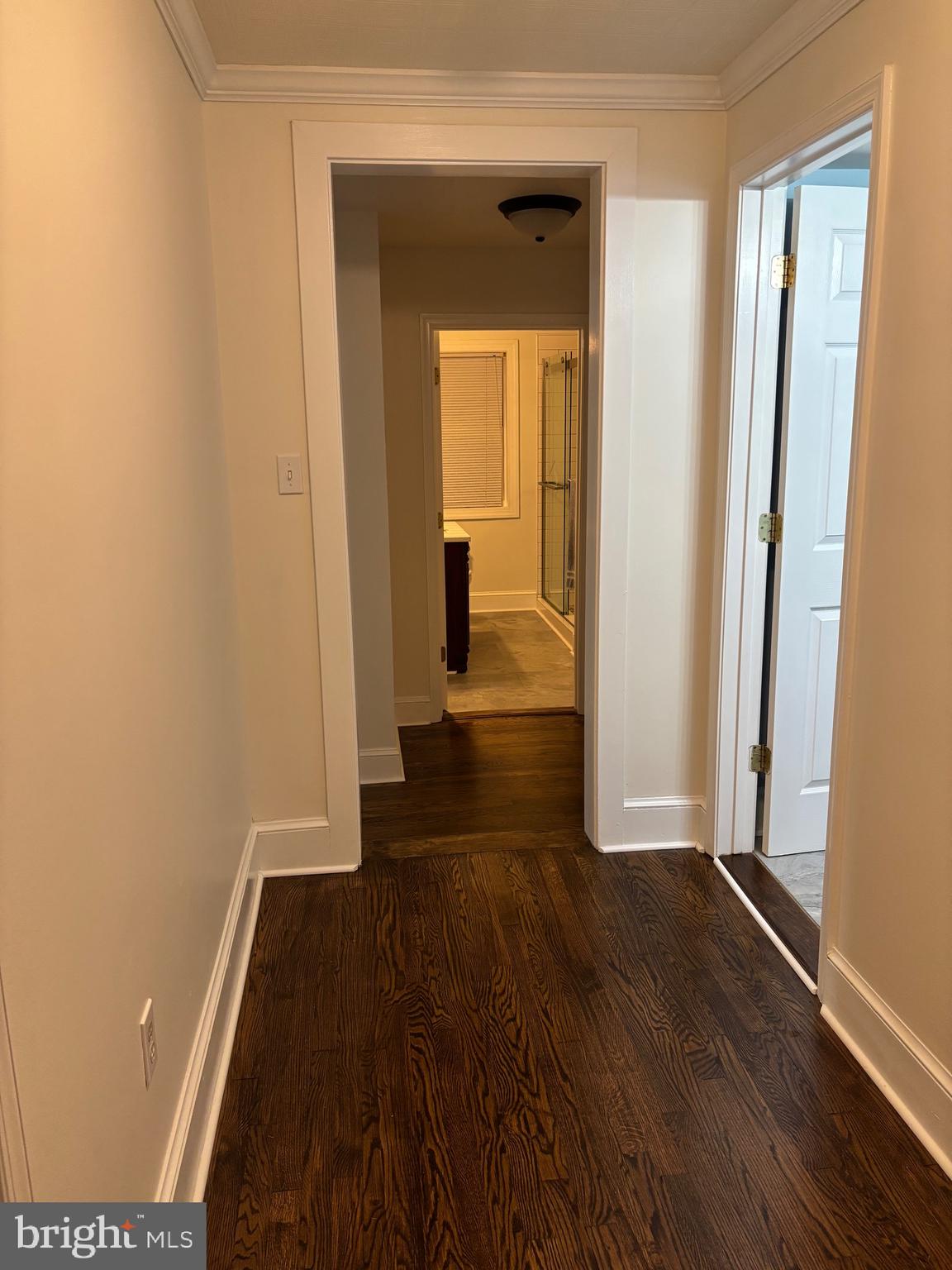 355-m F M F Bowen Road Huntingtown, MD 20639 - Photo 23 of 47 a view of a hallway with wooden floor