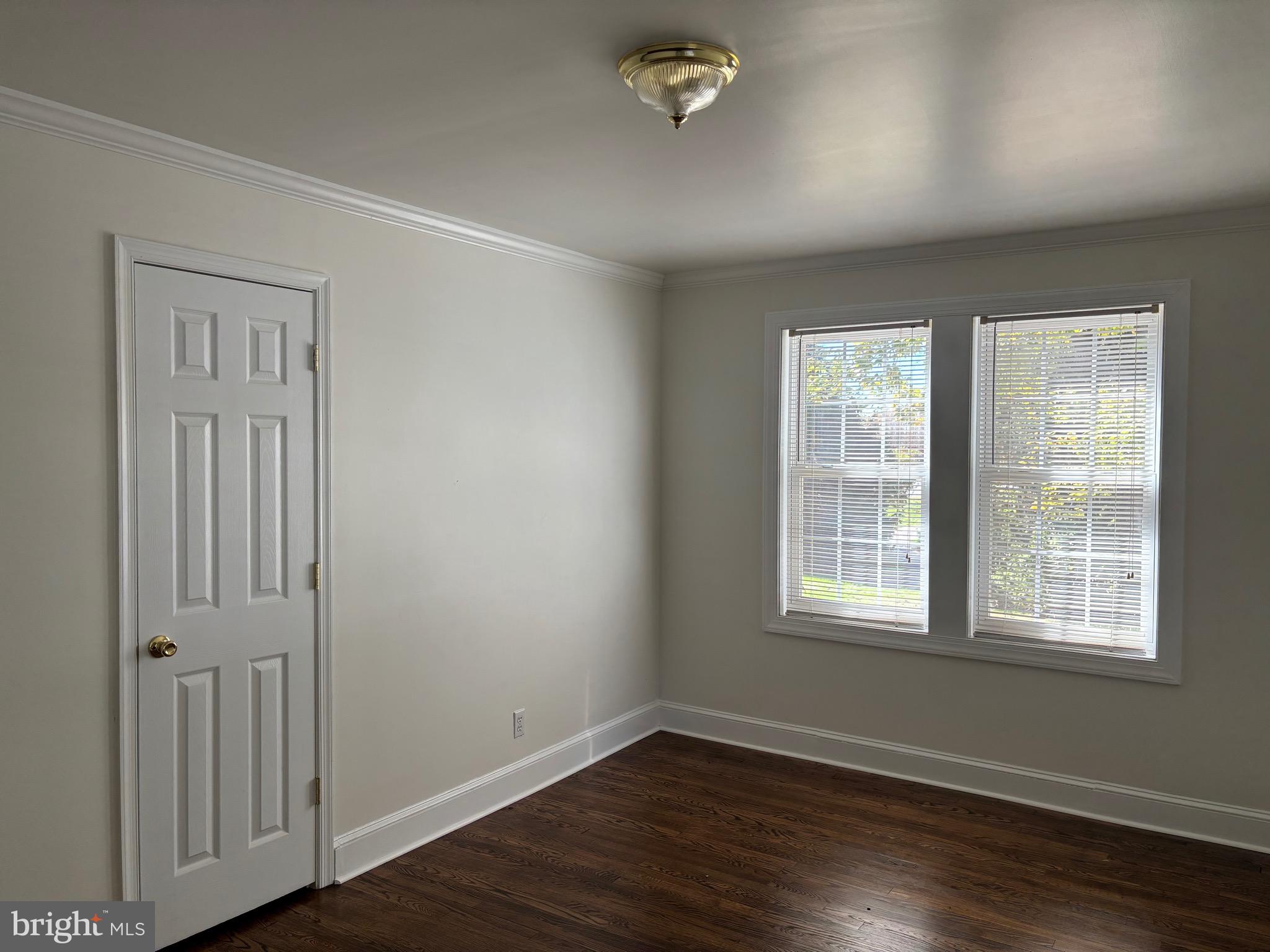 355-m F M F Bowen Road Huntingtown, MD 20639 - Photo 33 of 47 an empty room with wooden floor and windows