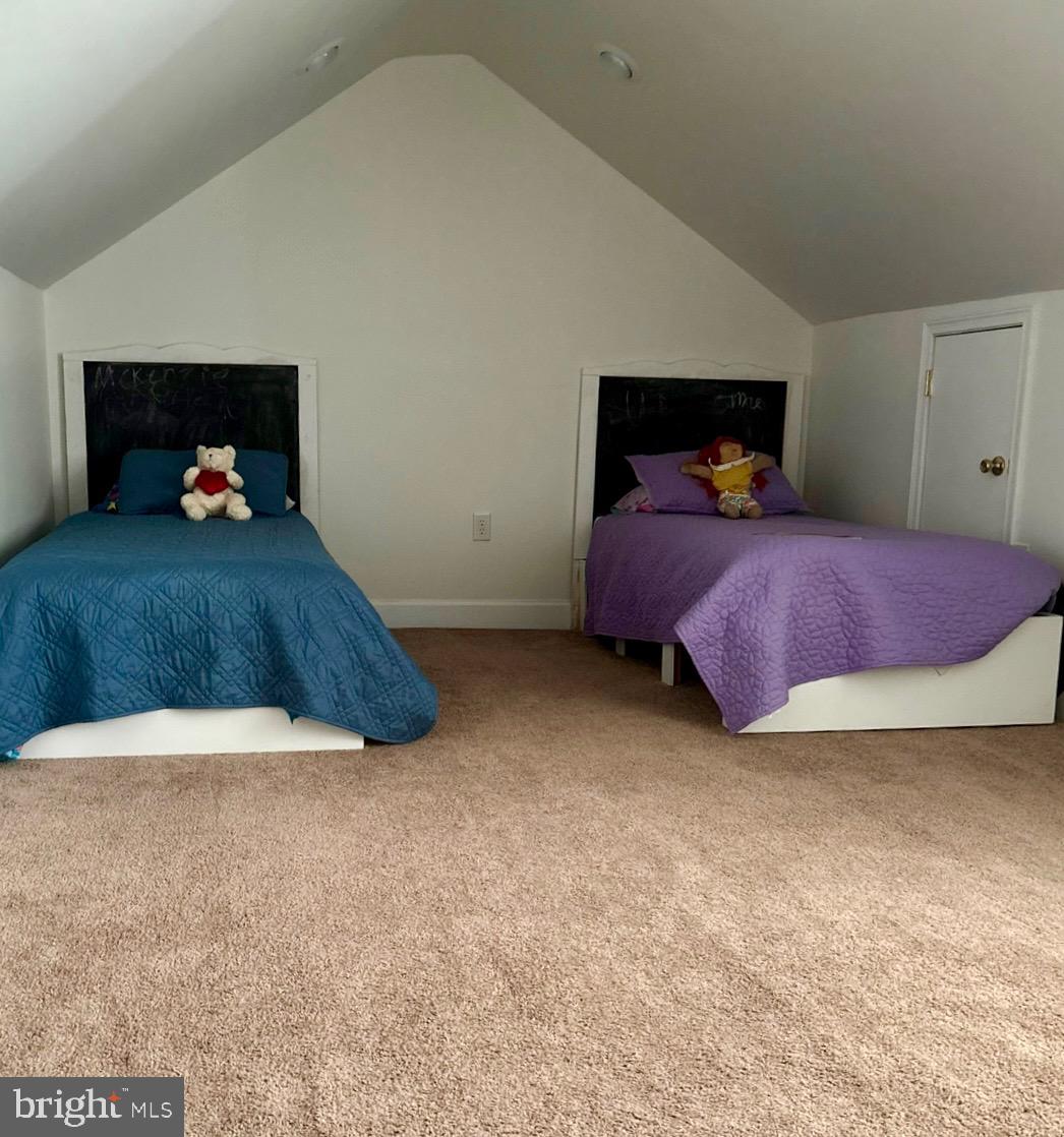 355-m F M F Bowen Road Huntingtown, MD 20639 - Photo 36 of 47 a bedroom with a bed and a dresser