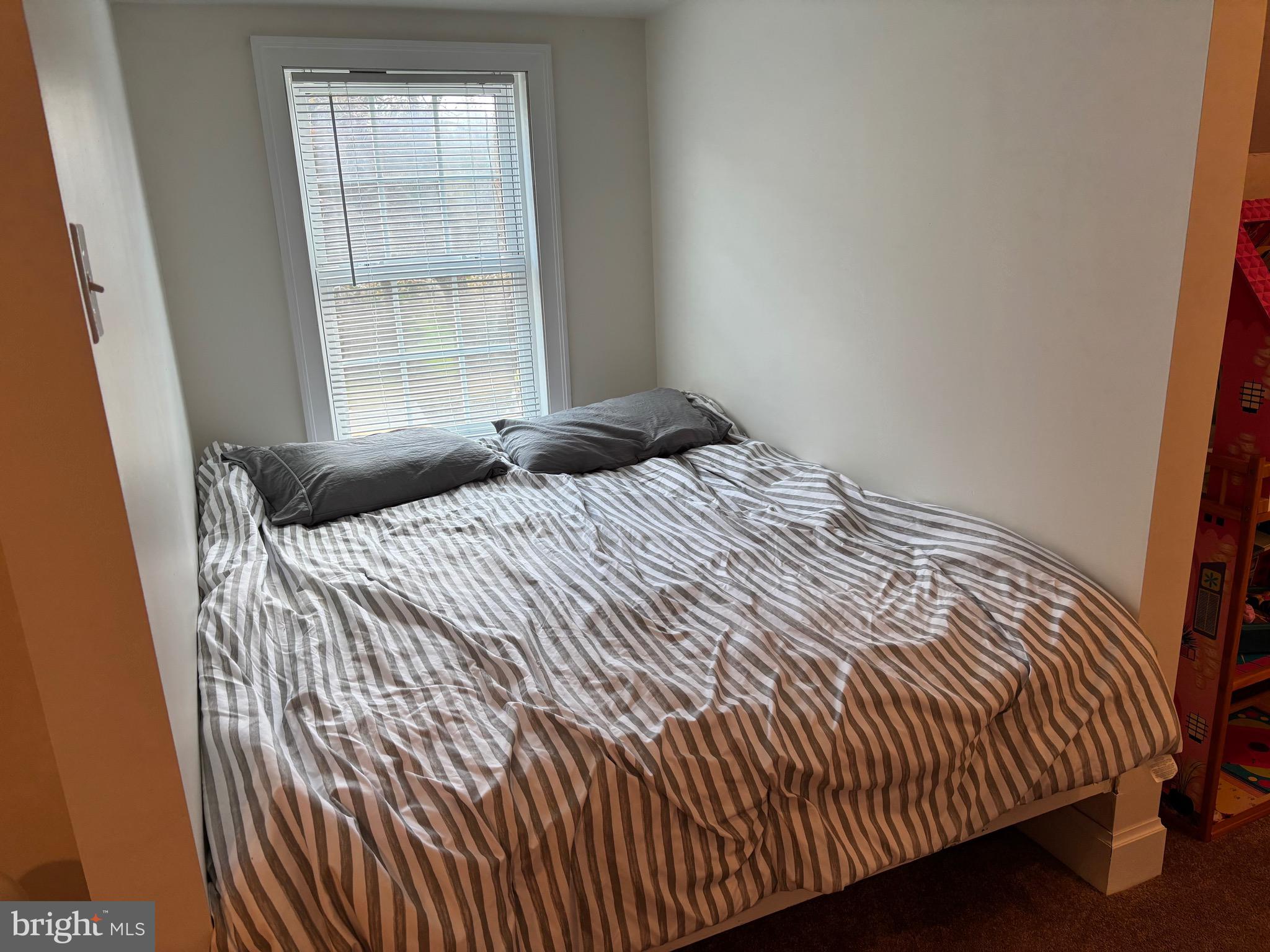 355-m F M F Bowen Road Huntingtown, MD 20639 - Photo 38 of 47 a bedroom with a bed and window
