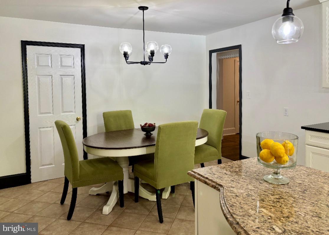 355-m F M F Bowen Road Huntingtown, MD 20639 - Photo 8 of 47 a view of a dining room with furniture