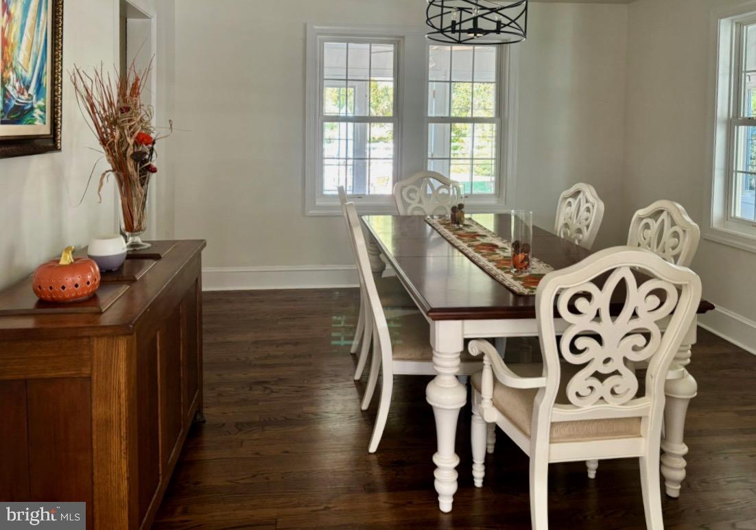 355-m F M F Bowen Road Huntingtown, MD 20639 - Photo 10 of 47 a view of a dining room with furniture window and wooden floor