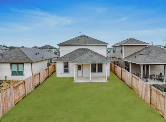 a front view of a house with yard