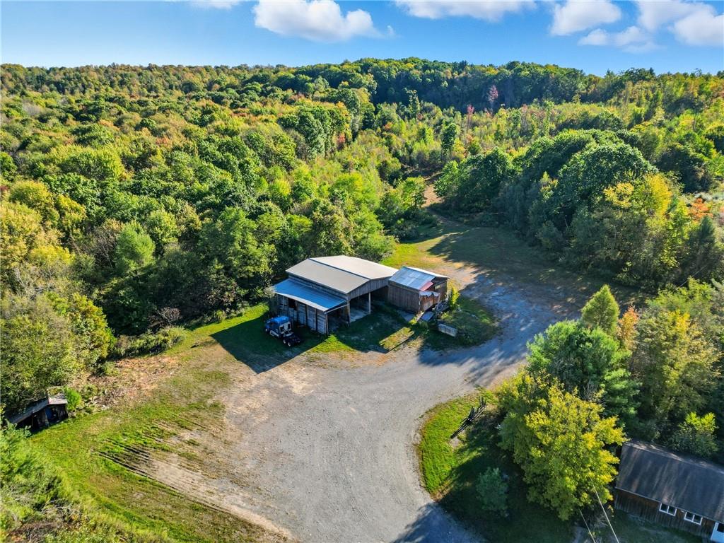 523 Farren Surrena Road Harrisville, PA 16038 - Photo 16 of 24 an aerial view of a house with a yard and lake view