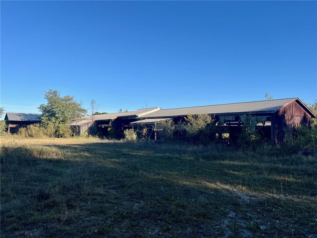523 Farren Surrena Road Harrisville, PA 16038 - Photo 7 of 24 a view of a yard with an outdoor space