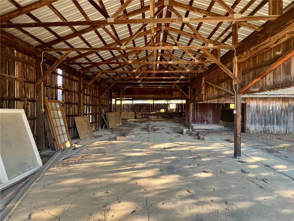 523 Farren Surrena Road Harrisville, PA 16038 - Photo 8 of 24 a view of a room with wooden walls
