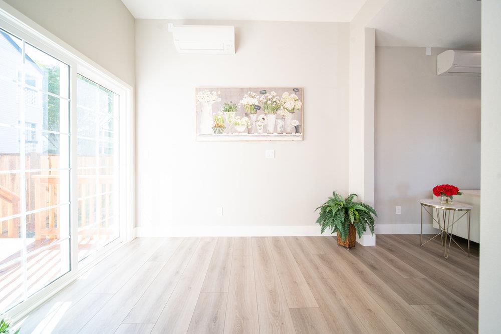 1701 Ringwood Avenue San Jose, CA 95131 - Photo 17 of 59 a view of a hallway with wooden floor and a potted plant