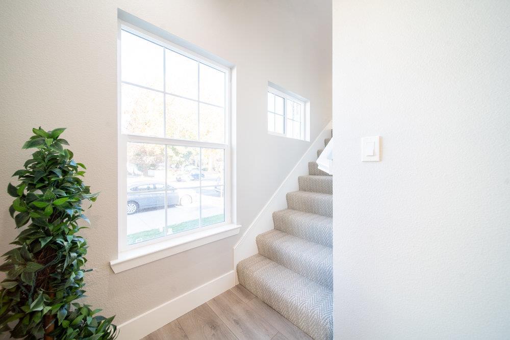 1701 Ringwood Avenue San Jose, CA 95131 - Photo 20 of 59 a view of staircase with white walls and windows