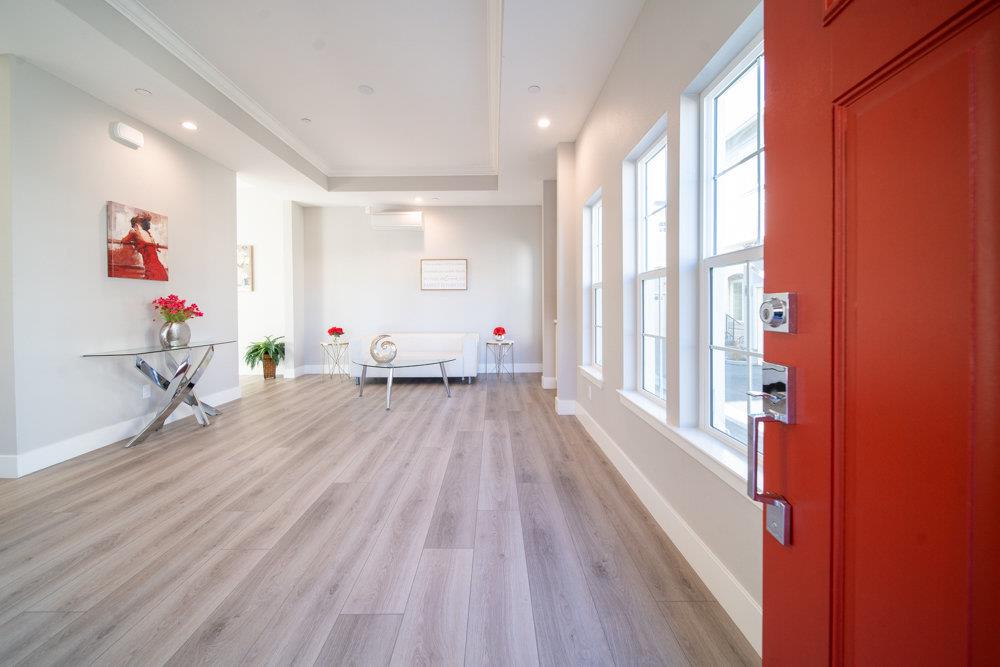 1701 Ringwood Avenue San Jose, CA 95131 - Photo 3 of 59 a view of a room with wooden floor and windows