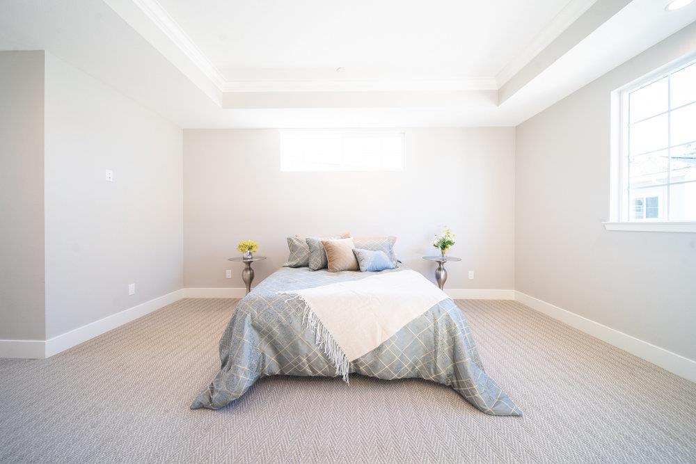 1701 Ringwood Avenue San Jose, CA 95131 - Photo 34 of 59 a bedroom with a bed and a window
