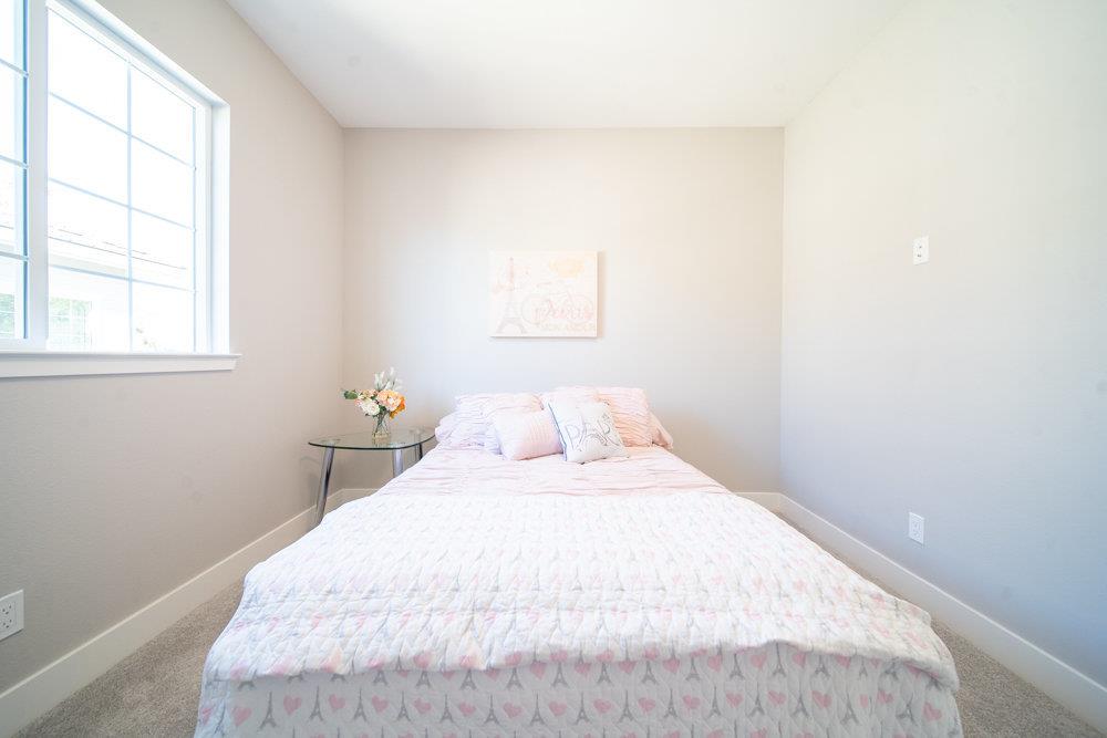 1701 Ringwood Avenue San Jose, CA 95131 - Photo 37 of 59 a bedroom with a bed and a window