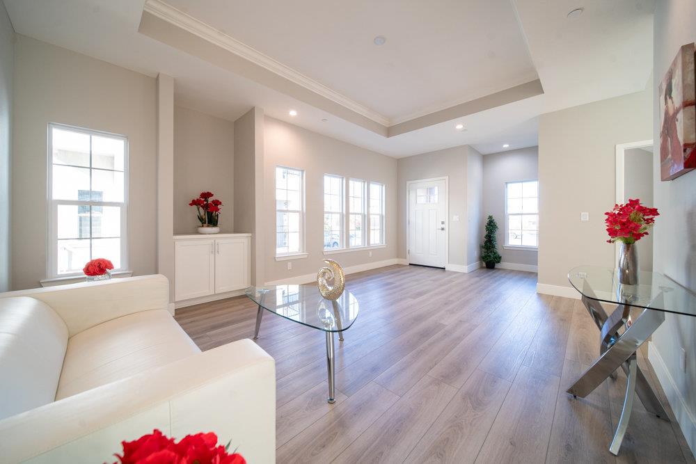 1701 Ringwood Avenue San Jose, CA 95131 - Photo 4 of 59 a living room with furniture and wooden floor