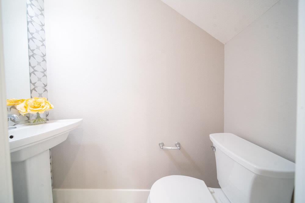 1701 Ringwood Avenue San Jose, CA 95131 - Photo 8 of 59 a bathroom with a toilet a sink and mirror