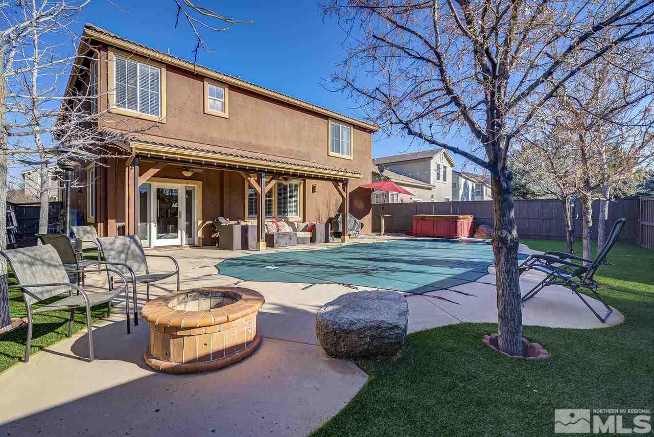 460 Ruffian Court Reno, NV 89521 - Photo 20 of 25 a view of a house with backyard and sitting area