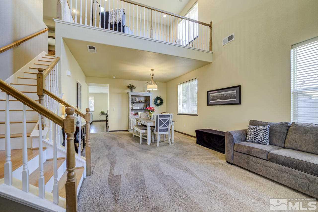 460 Ruffian Court Reno, NV 89521 - Photo 3 of 25 a living room with furniture and a wooden floor
