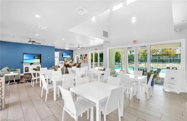 a view of a dining room with furniture window and outside view