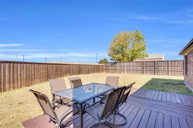 a swimming pool with wooden fence