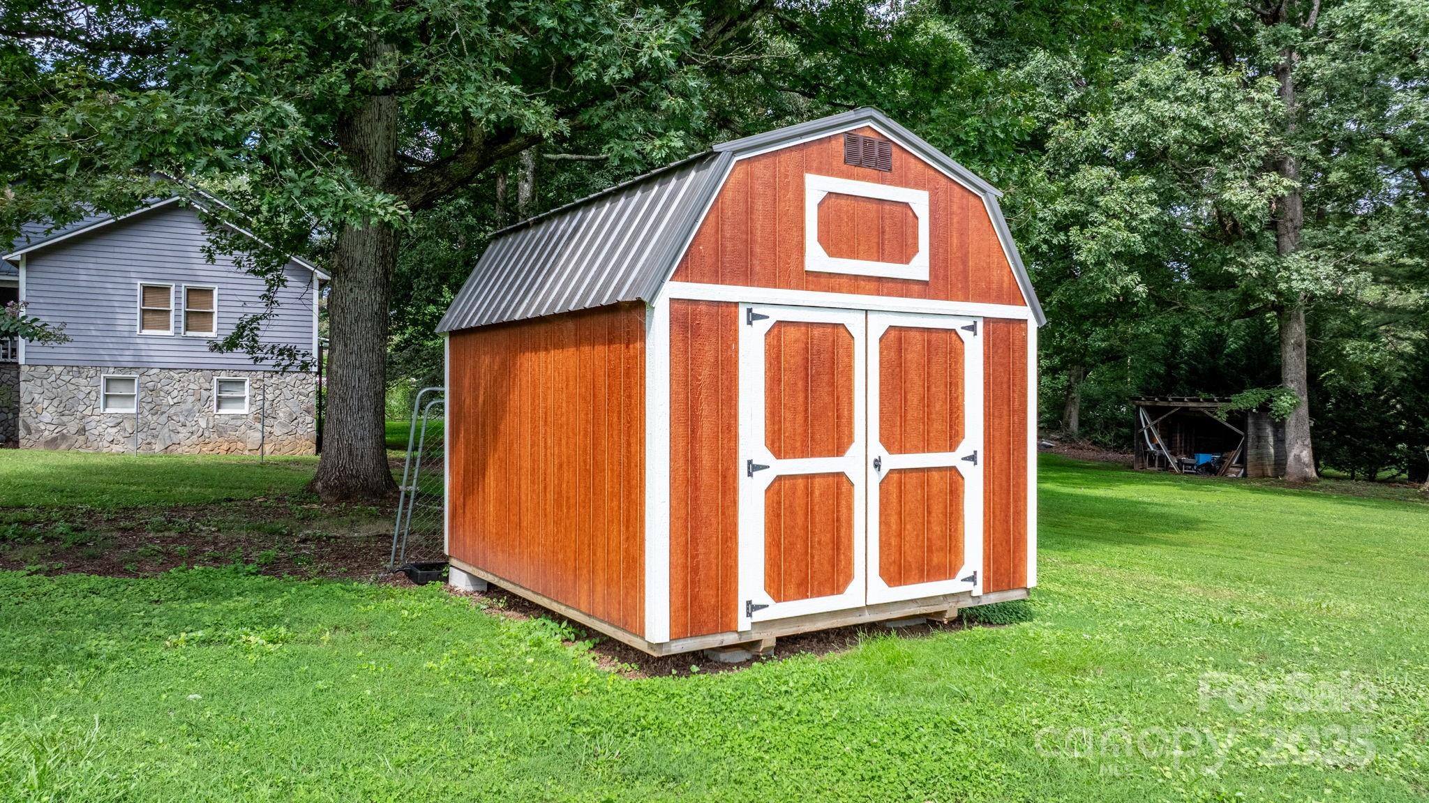 1838 Connelly Springs Road Lenoir, NC 28645 - Photo 21 of 24 a view of backyard with garden