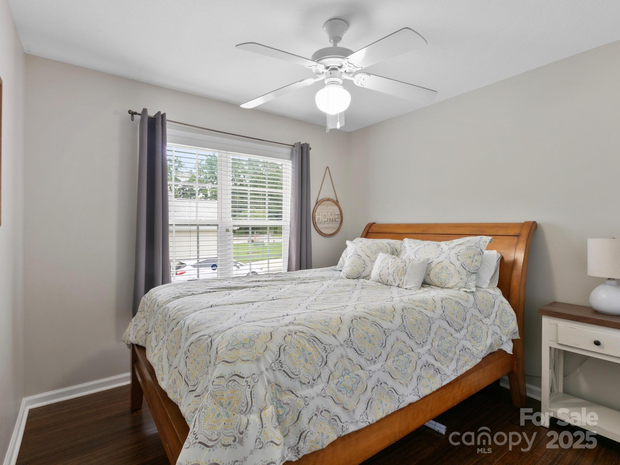 61 Village Street Clyde, NC 28721 - Photo 19 of 30 a bedroom with a bed and window