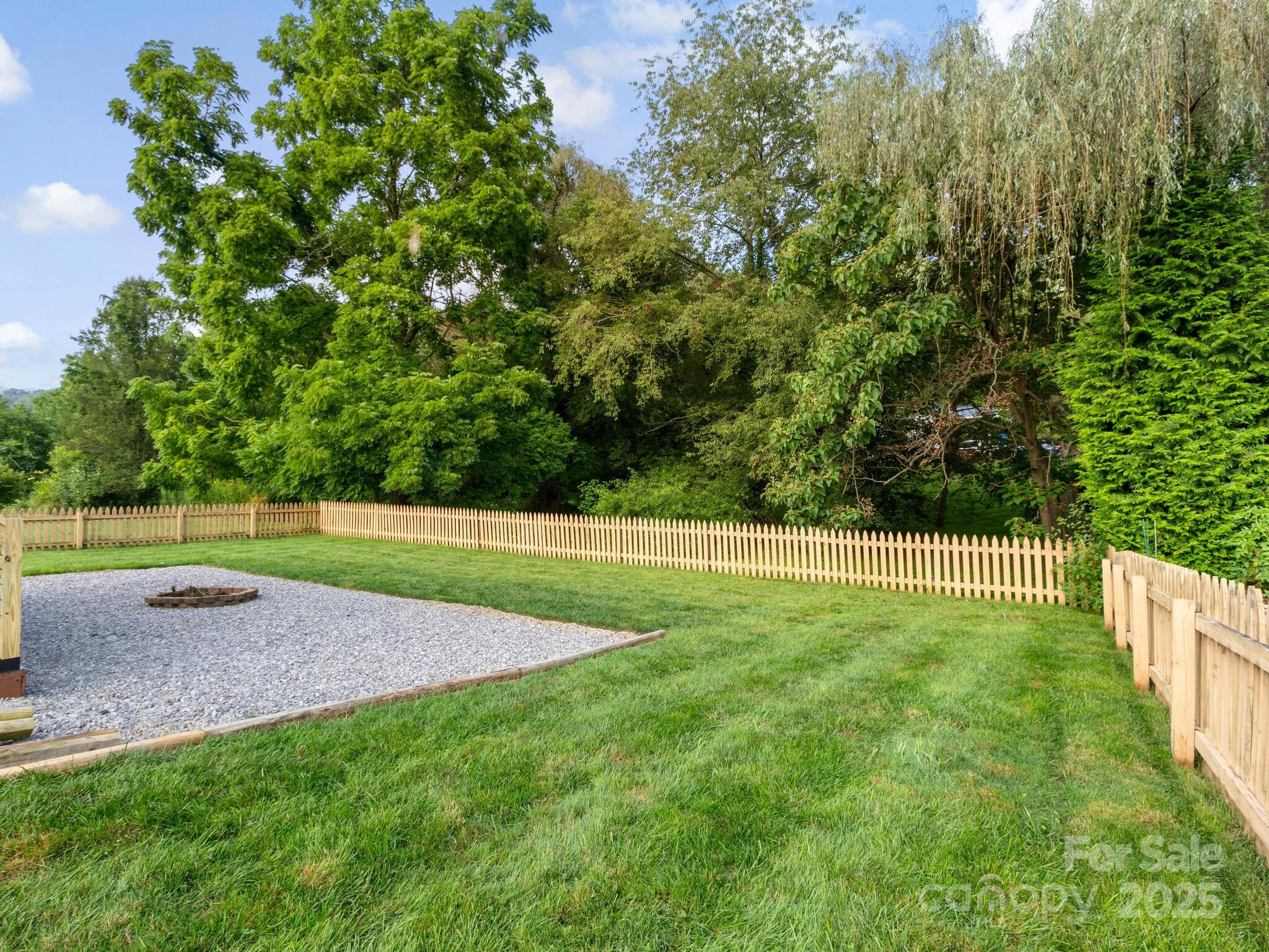 61 Village Street Clyde, NC 28721 - Photo 26 of 30 a view of a golf course