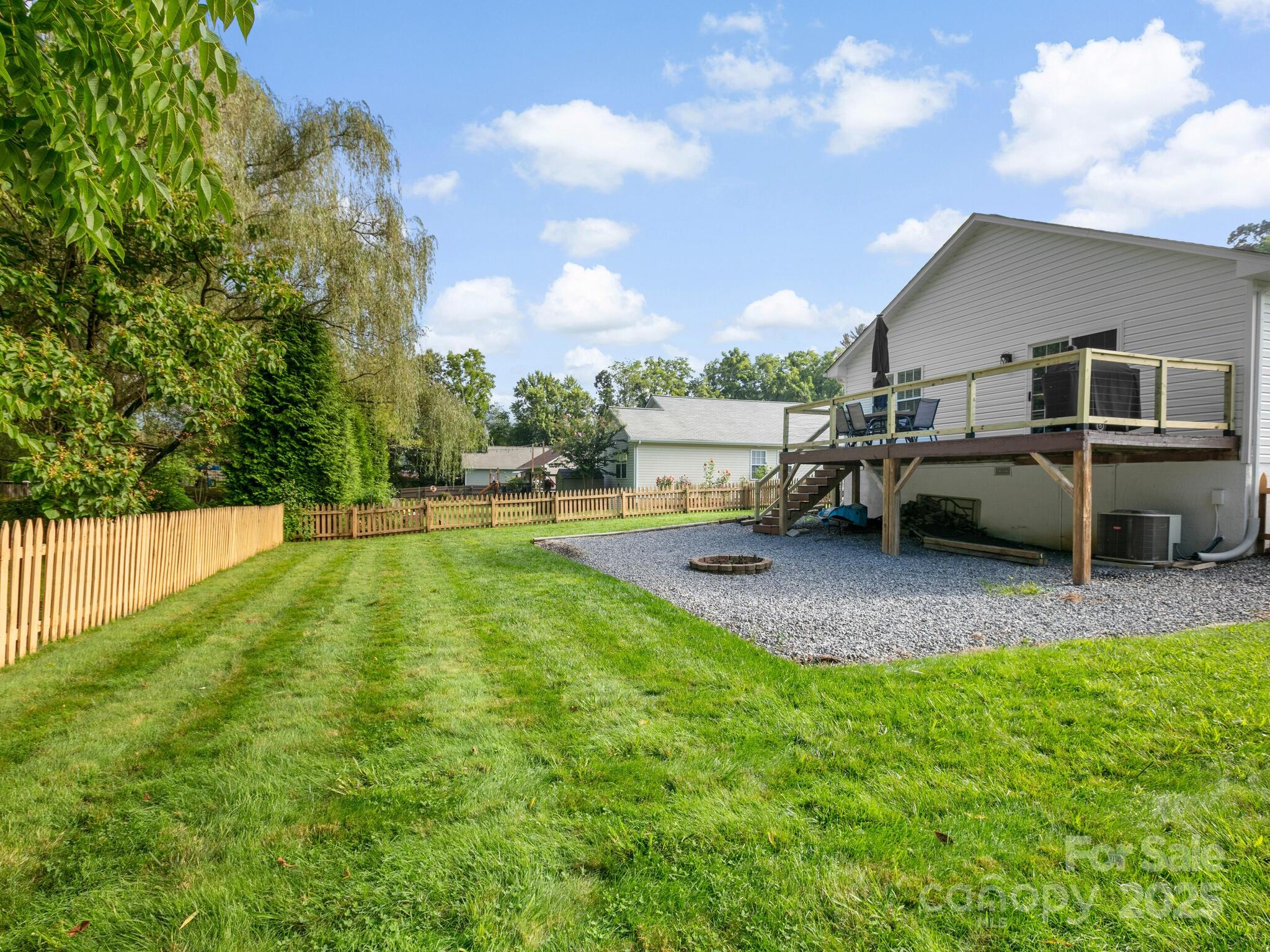 61 Village Street Clyde, NC 28721 - Photo 29 of 30 a view of a backyard with sitting area