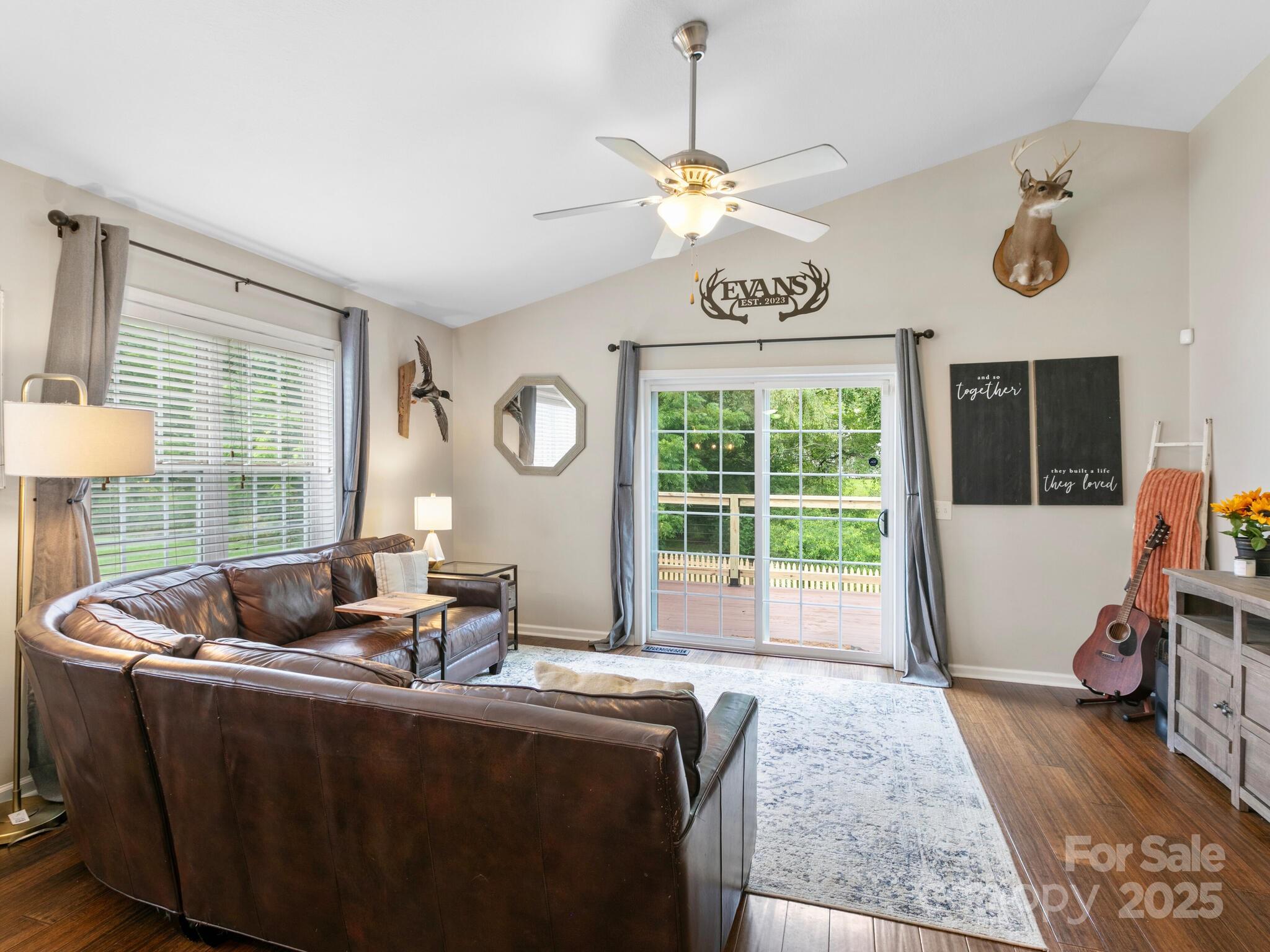 61 Village Street Clyde, NC 28721 - Photo 5 of 30 a living room with furniture and a window
