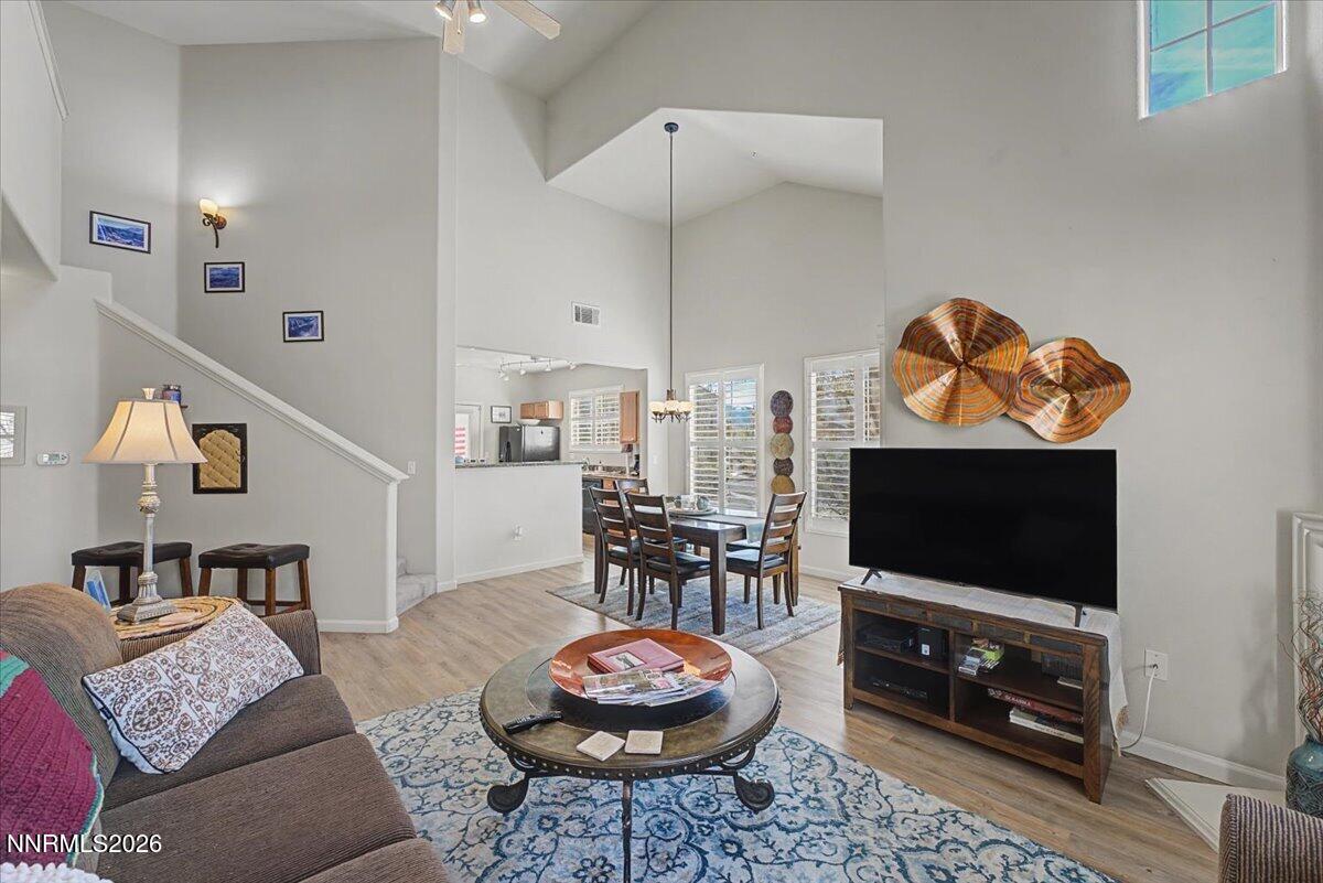 17000 Wedge Parkway, Unit 2625 Reno, NV 89511 - Photo 16 of 42 a living room with furniture and a flat screen tv