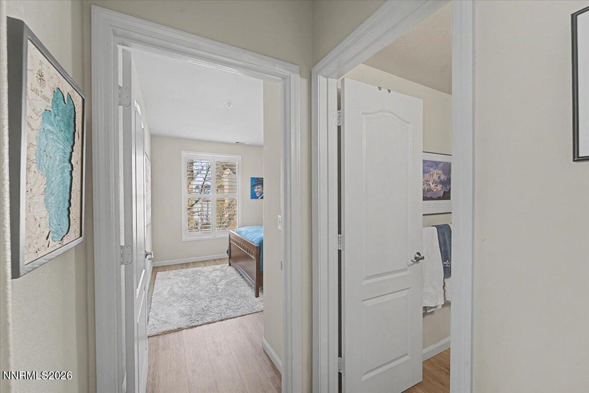 17000 Wedge Parkway, Unit 2625 Reno, NV 89511 - Photo 17 of 42 a en suite bathroom with a granite countertop sink and a mirror