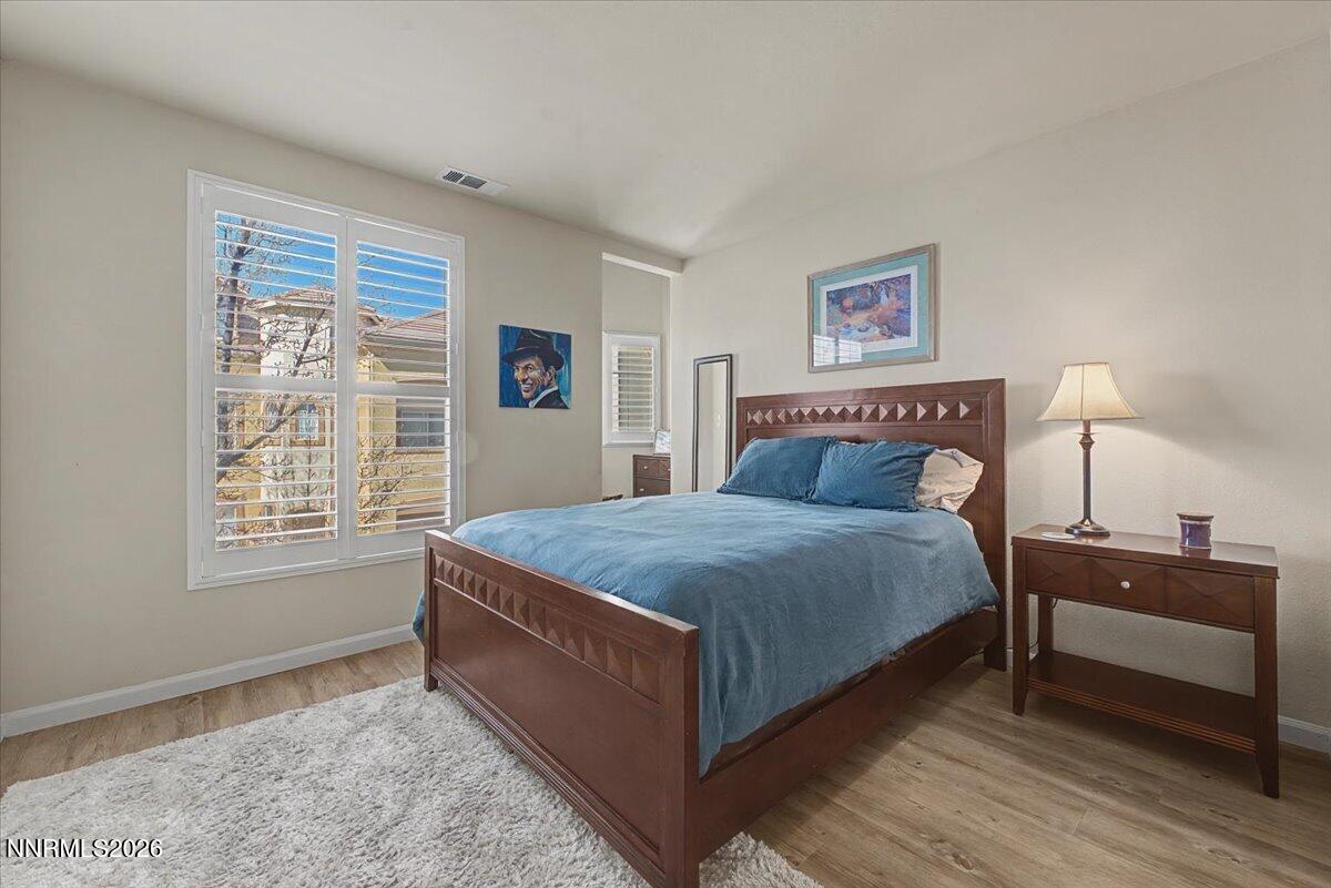 17000 Wedge Parkway, Unit 2625 Reno, NV 89511 - Photo 19 of 42 a bedroom with a bed and a window