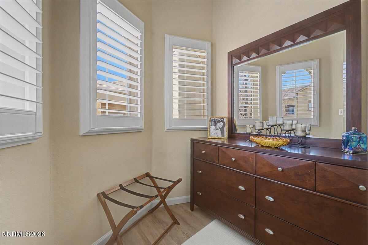 17000 Wedge Parkway, Unit 2625 Reno, NV 89511 - Photo 20 of 42 a room with a chair and window
