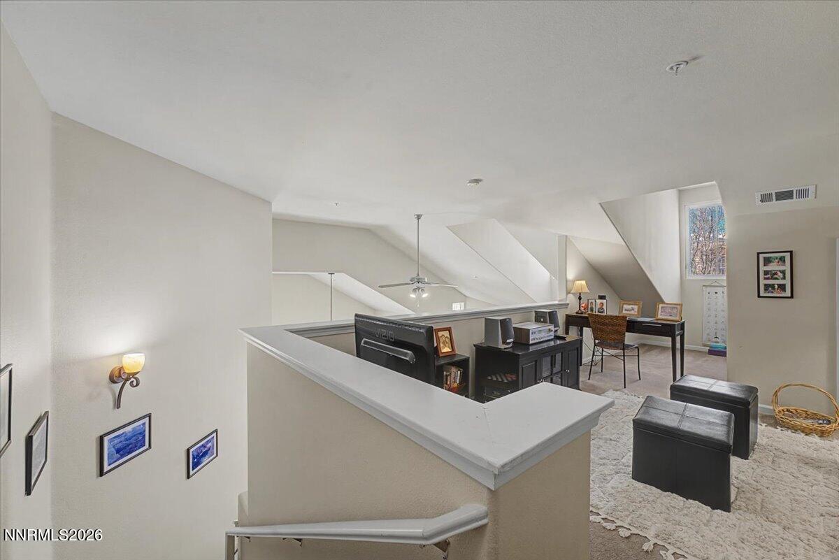 17000 Wedge Parkway, Unit 2625 Reno, NV 89511 - Photo 24 of 42 a living room with furniture and a table