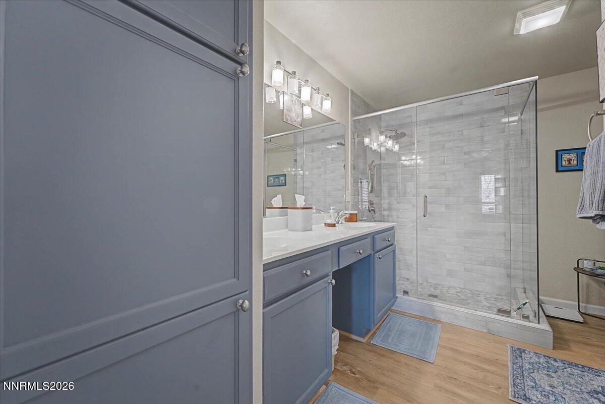 17000 Wedge Parkway, Unit 2625 Reno, NV 89511 - Photo 5 of 42 a bathroom with a shower sink and mirror