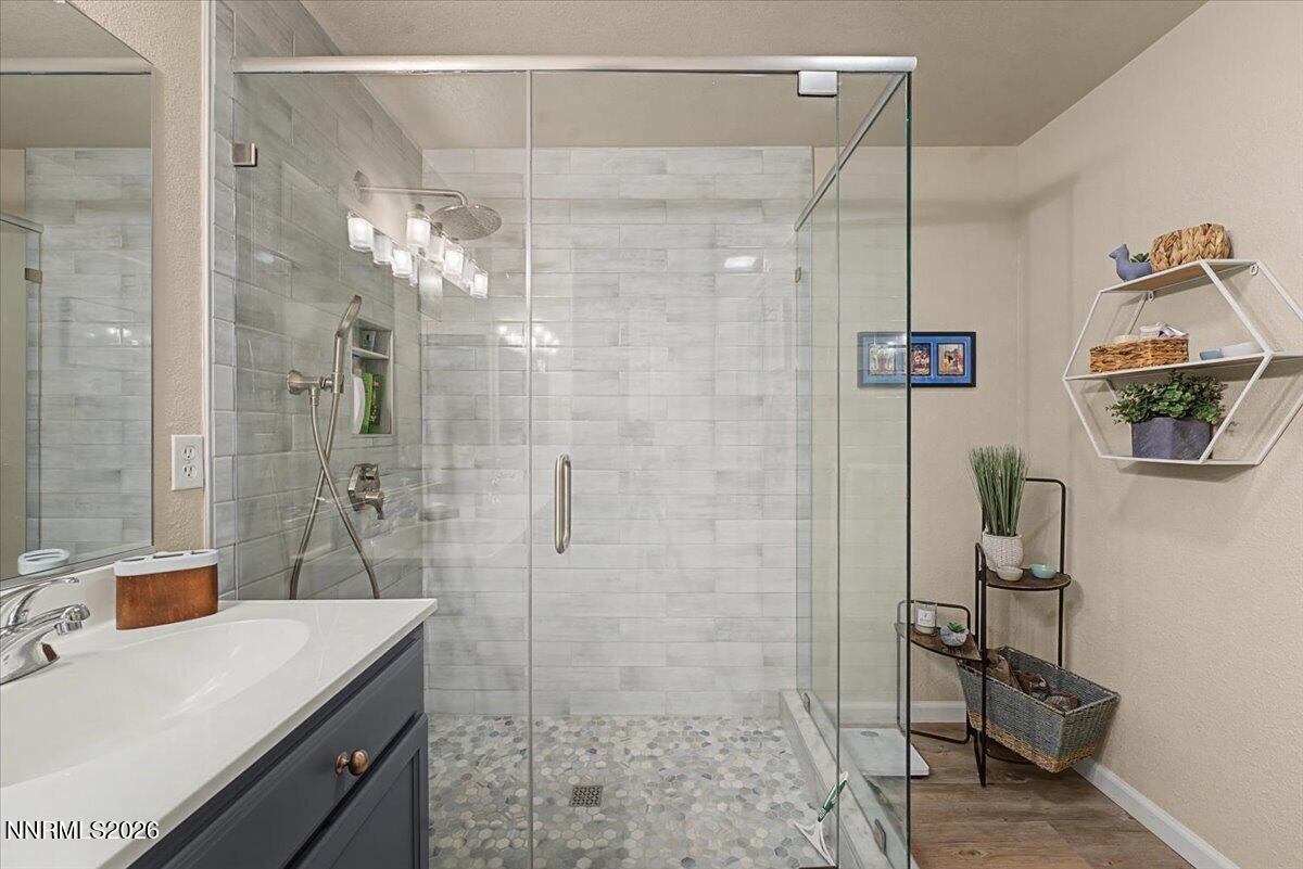 17000 Wedge Parkway, Unit 2625 Reno, NV 89511 - Photo 8 of 42 a bathroom with a sink a toilet and shower