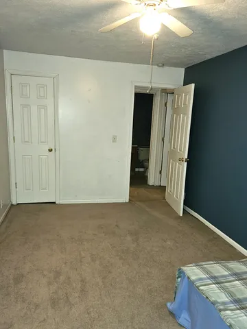 an empty room with a staircase