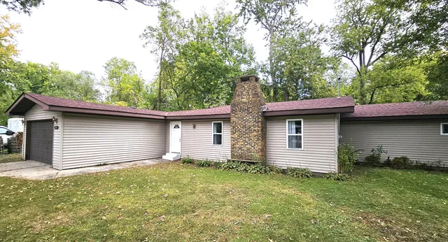 a backyard of a house with lots of green space