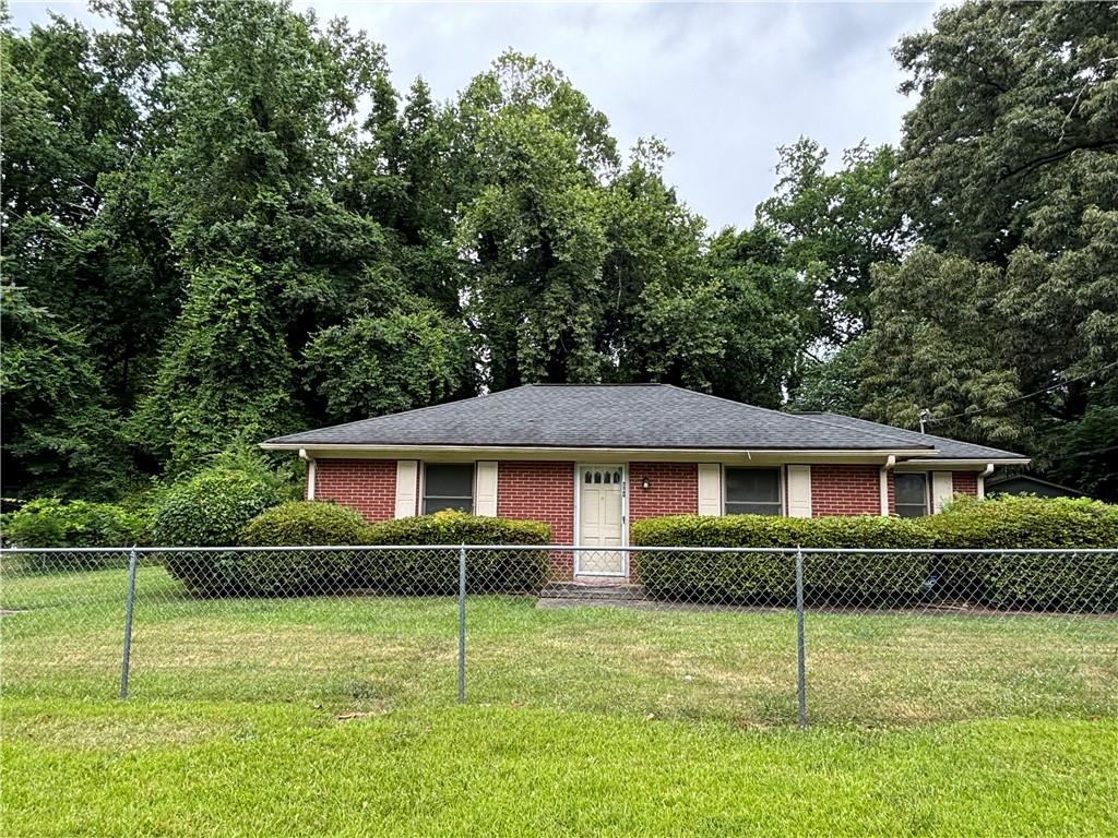 a house view with a garden space