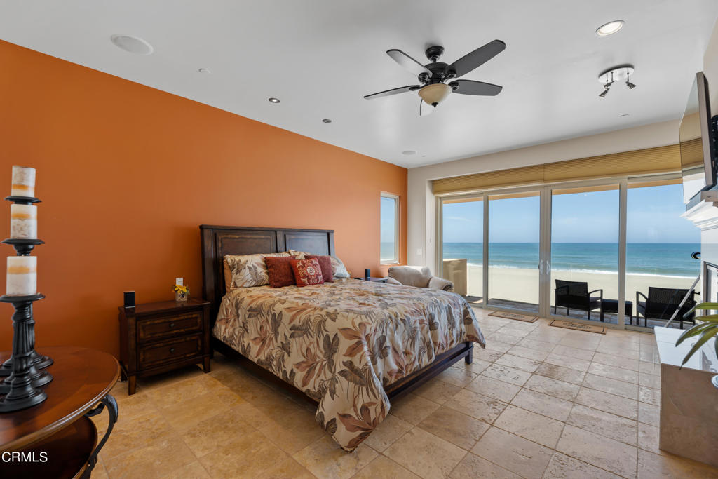 791 Mandalay Beach Road Oxnard, CA 93035 - Photo 26 of 46 a bed room with a bed and a large window