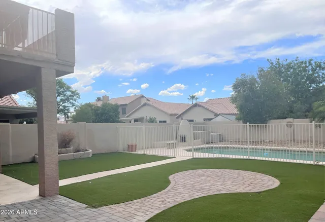 a view of a house with a big yard