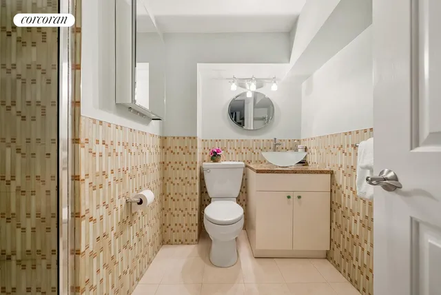 a workspace room with furniture and a window