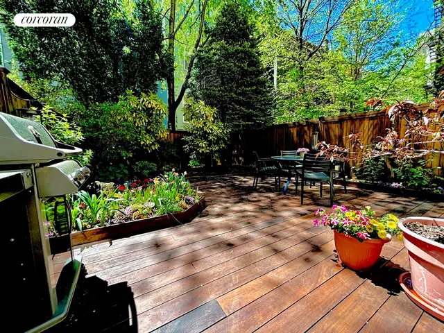 a spacious bathroom with a double vanity sink a mirror and a bathtub