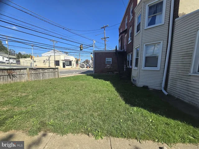 a view of a porch with a yard