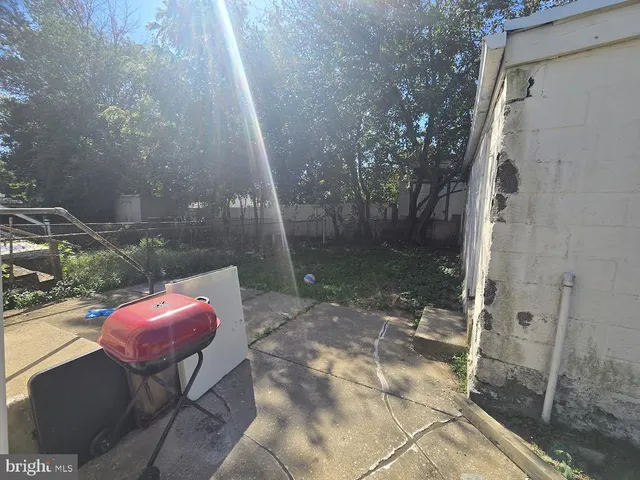a view of a porch with furniture