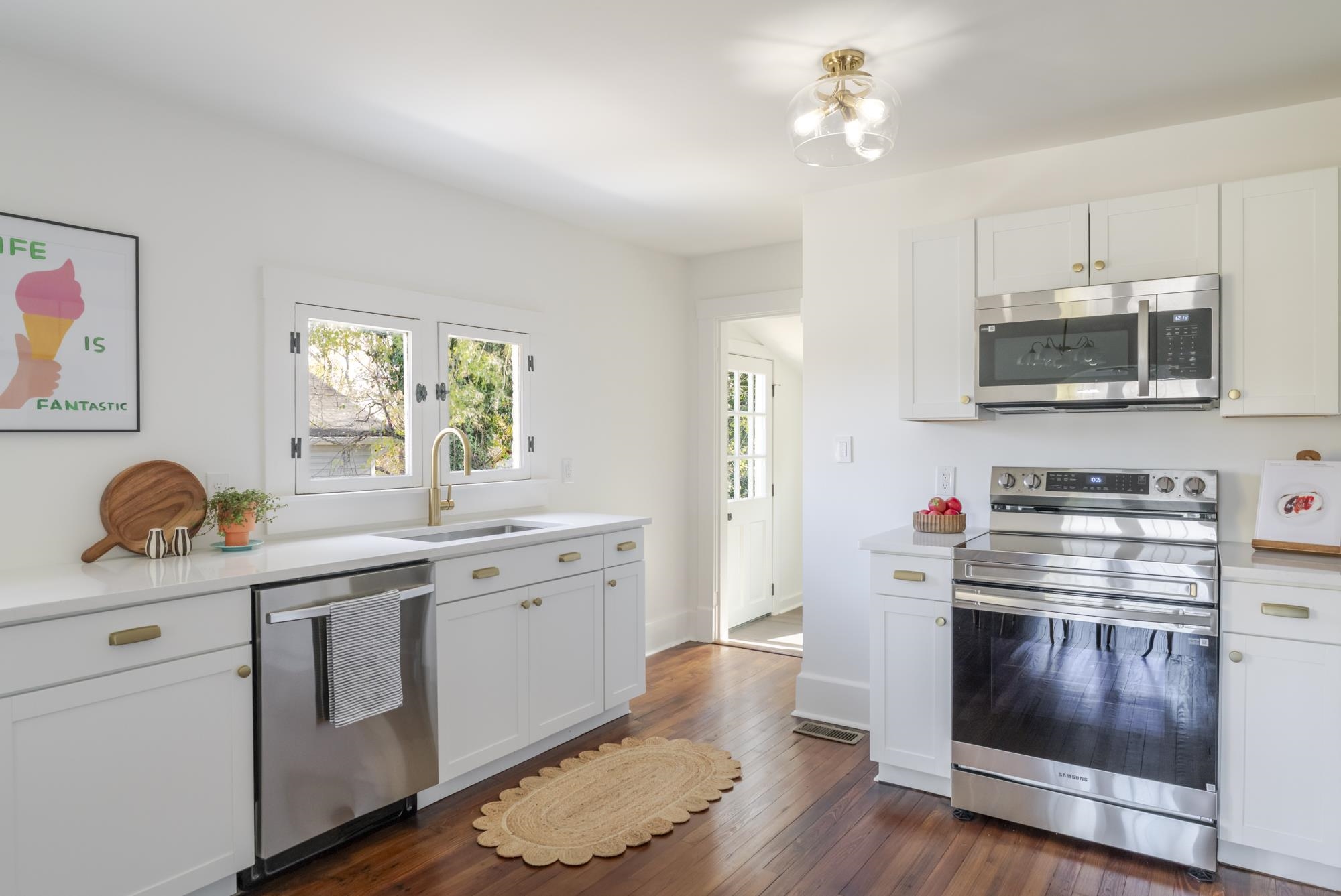 2216 Noon Street Staunton, VA 24401 - Photo 12 of 26 a kitchen with stainless steel appliances granite countertop a stove and a sink