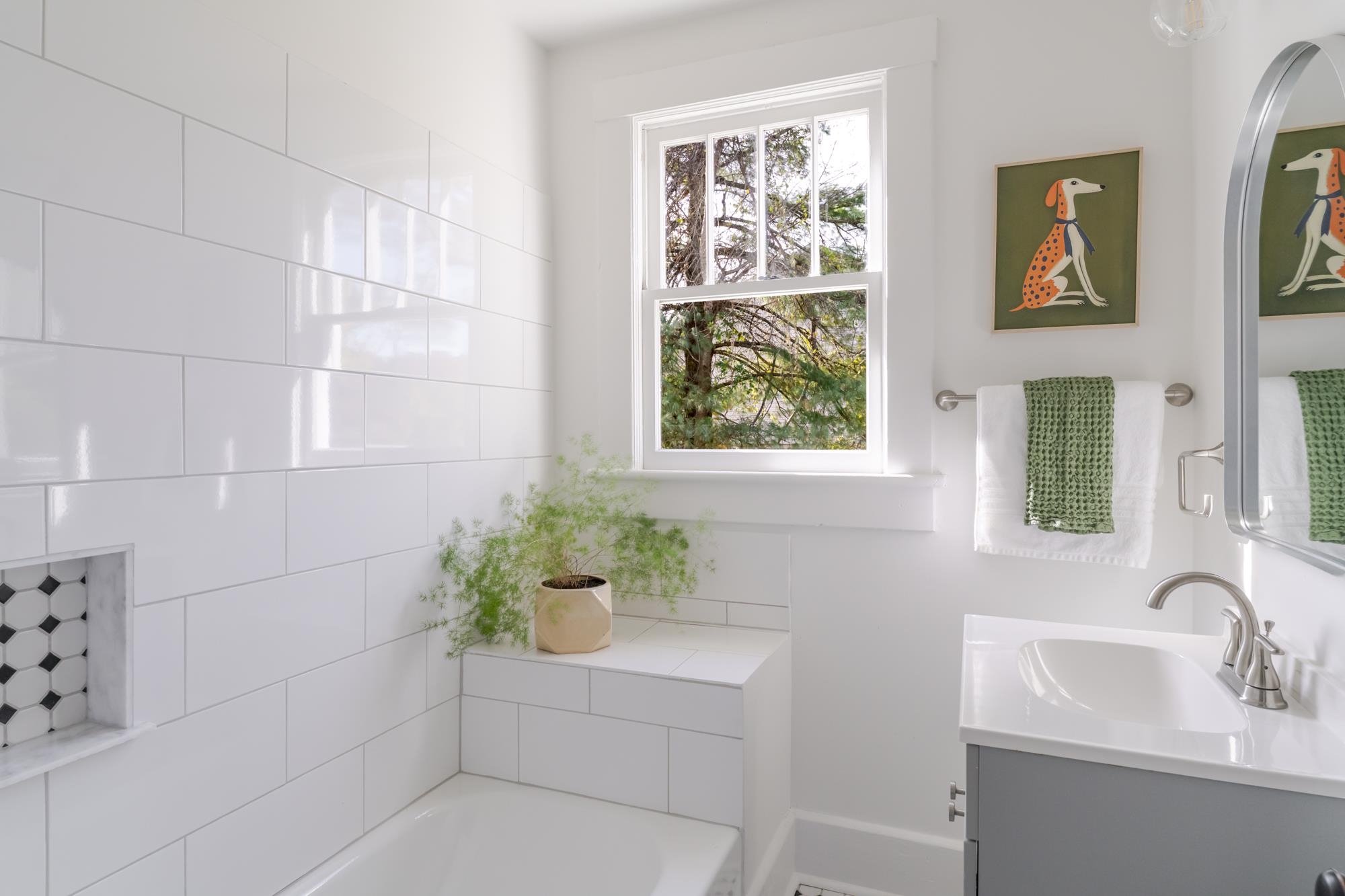2216 Noon Street Staunton, VA 24401 - Photo 15 of 26 a white bath tub sitting next to a white sink