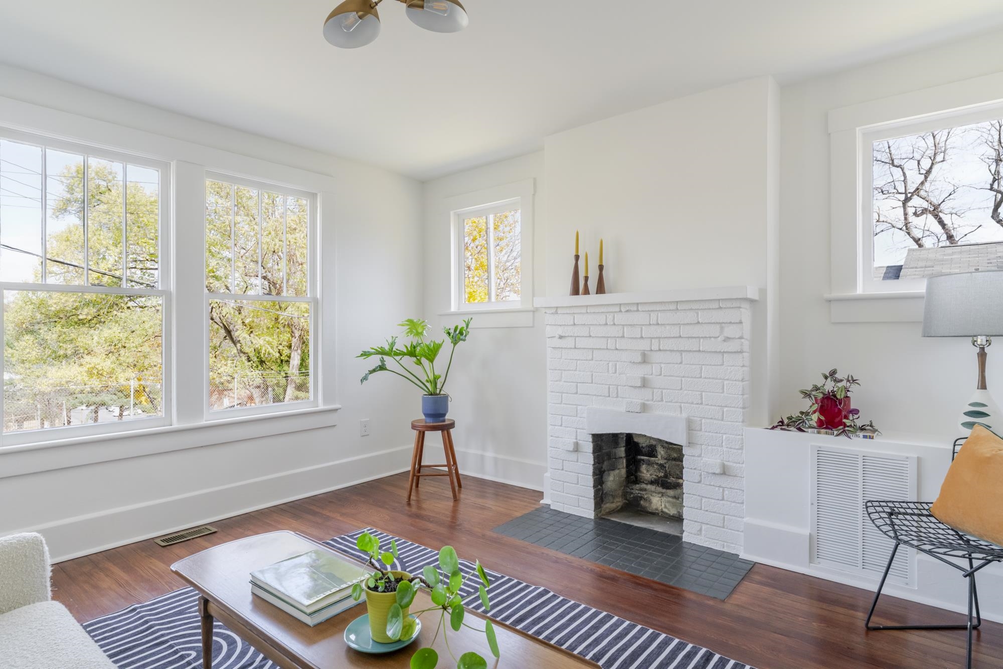 2216 Noon Street Staunton, VA 24401 - Photo 4 of 26 a living room with furniture fireplace and window