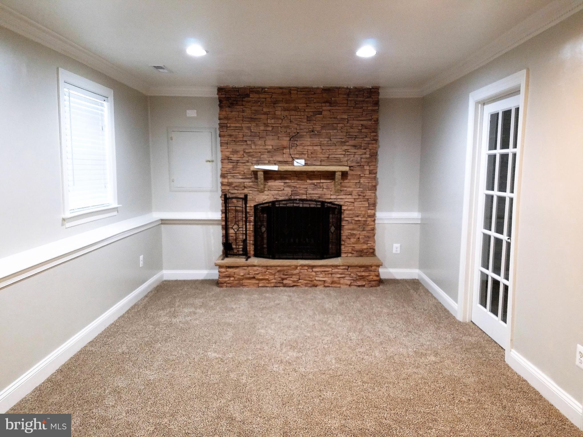 113 Applecreek Road Frederick, MD 21702 - Photo 14 of 22 Fam Rm with new carpet and wood-burning fireplace