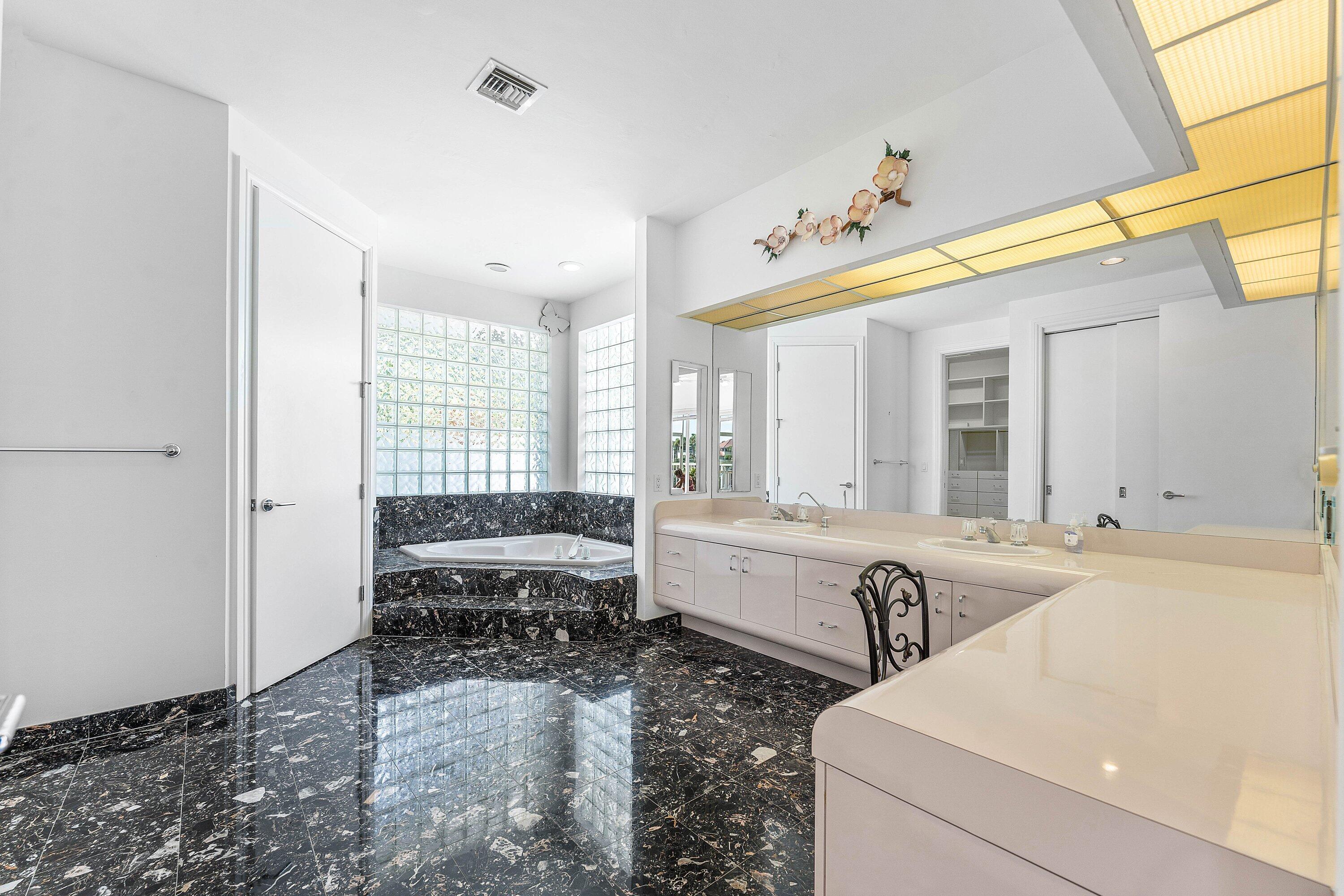 4 Sutton Drive Boynton Beach, FL 33436 - Photo 30 of 90 Primary Bath 1