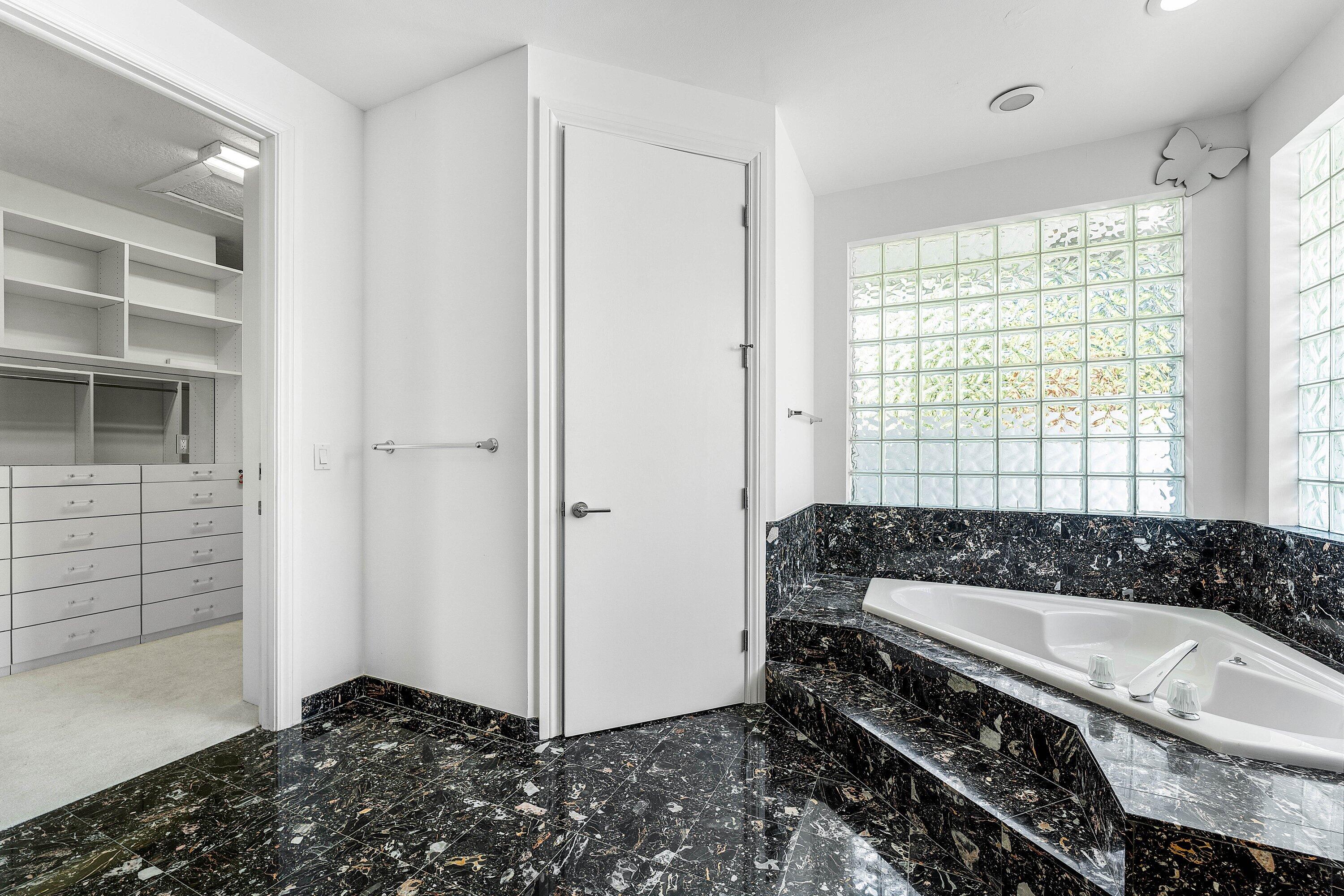 4 Sutton Drive Boynton Beach, FL 33436 - Photo 32 of 90 Primary Bath 1