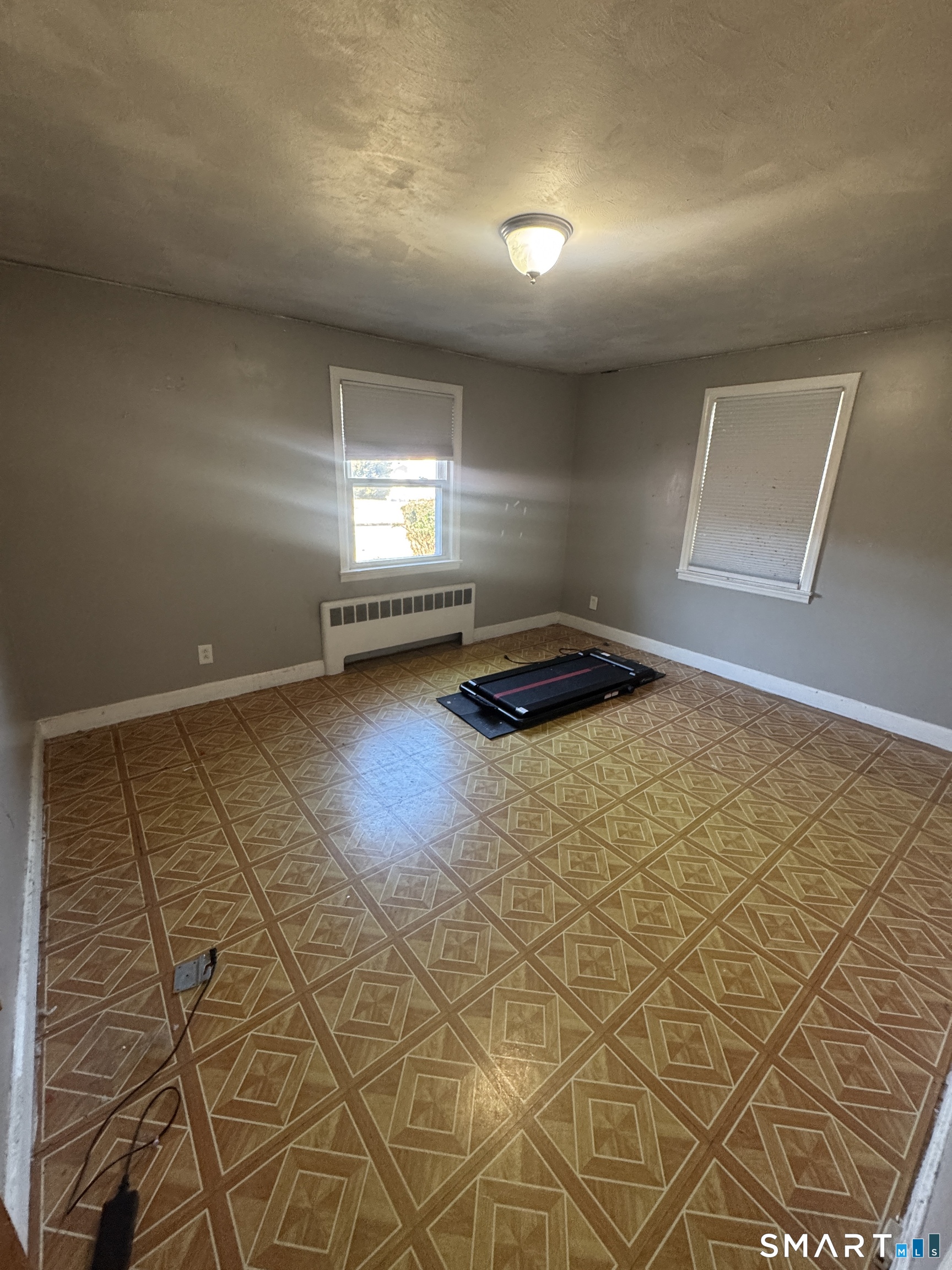 105 Crown Street Bristol, CT 06010 - Photo 13 of 20 a view of a room with gym equipment